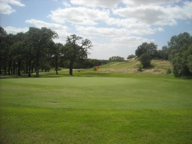 Great building site with mature shade trees, .62 of an acre on Nocona Hills Golf Course in Texas - for sale on GolfHomes.com, golf home, golf lot