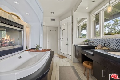 Perched above the Woodland Hills Country Club, this classic 1953 on Woodland Hills Country Club in California - for sale on GolfHomes.com, golf home, golf lot