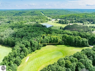 Tucked away in a private setting with frontage on the 13th hole on Schuss Mountain Golf Club in Michigan - for sale on GolfHomes.com, golf home, golf lot