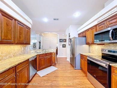 Spacious, gracious 2/2/2 + den pool home, on 14th green of on Silverthorn Country Club in Florida - for sale on GolfHomes.com, golf home, golf lot