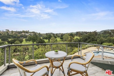 Perched above the Woodland Hills Country Club, this classic 1953 on Woodland Hills Country Club in California - for sale on GolfHomes.com, golf home, golf lot