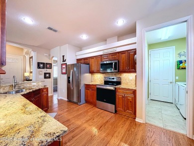 Spacious, gracious 2/2/2 + den pool home, on 14th green of on Silverthorn Country Club in Florida - for sale on GolfHomes.com, golf home, golf lot