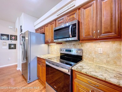 Spacious, gracious 2/2/2 + den pool home, on 14th green of on Silverthorn Country Club in Florida - for sale on GolfHomes.com, golf home, golf lot