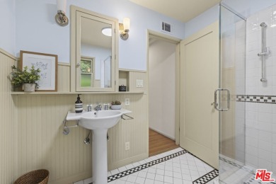 Perched above the Woodland Hills Country Club, this classic 1953 on Woodland Hills Country Club in California - for sale on GolfHomes.com, golf home, golf lot