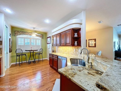Spacious, gracious 2/2/2 + den pool home, on 14th green of on Silverthorn Country Club in Florida - for sale on GolfHomes.com, golf home, golf lot
