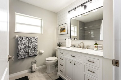 Welcome to this stunning 3-bedroom, 2-full-bath pool home on The Grand Club Cypress Course in Florida - for sale on GolfHomes.com, golf home, golf lot