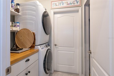 Welcome to this stunning 3-bedroom, 2-full-bath pool home on The Grand Club Cypress Course in Florida - for sale on GolfHomes.com, golf home, golf lot