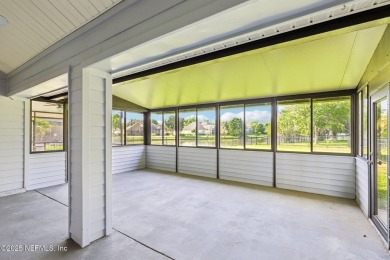 Beautiful 4/2/2 home located in highly desirable Eagle Harbor in on Eagle Harbor Golf Club in Florida - for sale on GolfHomes.com, golf home, golf lot