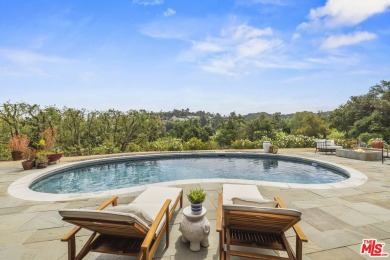 Perched above the Woodland Hills Country Club, this classic 1953 on Woodland Hills Country Club in California - for sale on GolfHomes.com, golf home, golf lot