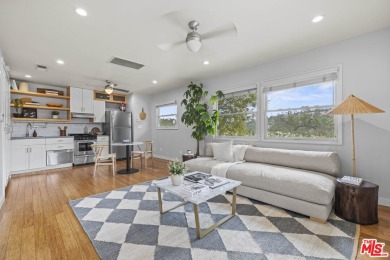 Perched above the Woodland Hills Country Club, this classic 1953 on Woodland Hills Country Club in California - for sale on GolfHomes.com, golf home, golf lot