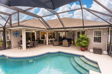 Welcome to this stunning 3-bedroom, 2-full-bath pool home on The Grand Club Cypress Course in Florida - for sale on GolfHomes.com, golf home, golf lot