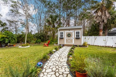 Welcome to this stunning 3-bedroom, 2-full-bath pool home on The Grand Club Cypress Course in Florida - for sale on GolfHomes.com, golf home, golf lot