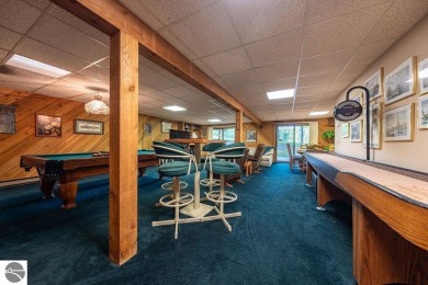 Tucked away in a private setting with frontage on the 13th hole on Schuss Mountain Golf Club in Michigan - for sale on GolfHomes.com, golf home, golf lot
