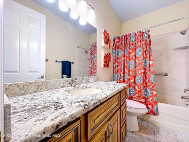 Spacious, gracious 2/2/2 + den pool home, on 14th green of on Silverthorn Country Club in Florida - for sale on GolfHomes.com, golf home, golf lot