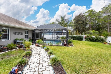 Welcome to this stunning 3-bedroom, 2-full-bath pool home on The Grand Club Cypress Course in Florida - for sale on GolfHomes.com, golf home, golf lot