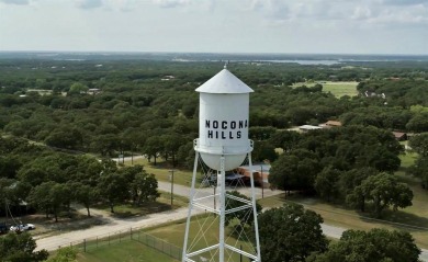 Great building site with mature shade trees, .62 of an acre on Nocona Hills Golf Course in Texas - for sale on GolfHomes.com, golf home, golf lot