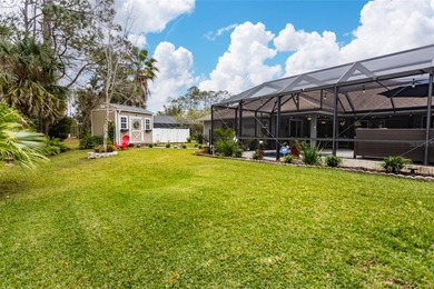 Welcome to this stunning 3-bedroom, 2-full-bath pool home on The Grand Club Cypress Course in Florida - for sale on GolfHomes.com, golf home, golf lot