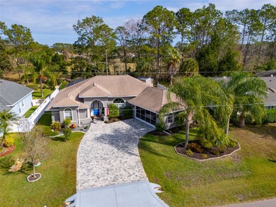 Welcome to this stunning 3-bedroom, 2-full-bath pool home on The Grand Club Cypress Course in Florida - for sale on GolfHomes.com, golf home, golf lot