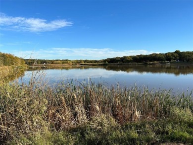 Great building site with mature shade trees, .62 of an acre on Nocona Hills Golf Course in Texas - for sale on GolfHomes.com, golf home, golf lot