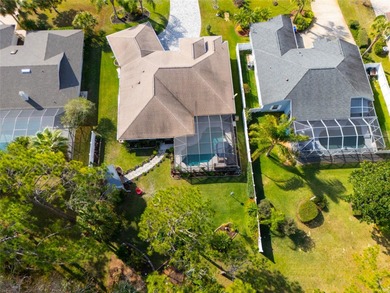 Welcome to this stunning 3-bedroom, 2-full-bath pool home on The Grand Club Cypress Course in Florida - for sale on GolfHomes.com, golf home, golf lot