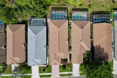 Spacious, gracious 2/2/2 + den pool home, on 14th green of on Silverthorn Country Club in Florida - for sale on GolfHomes.com, golf home, golf lot