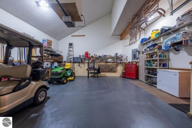 Tucked away in a private setting with frontage on the 13th hole on Schuss Mountain Golf Club in Michigan - for sale on GolfHomes.com, golf home, golf lot