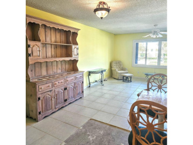 Unlock the potential of this 2-bedroom, 2-bath second-floor on Martin County Golf Course in Florida - for sale on GolfHomes.com, golf home, golf lot