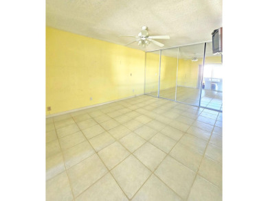 Unlock the potential of this 2-bedroom, 2-bath second-floor on Martin County Golf Course in Florida - for sale on GolfHomes.com, golf home, golf lot