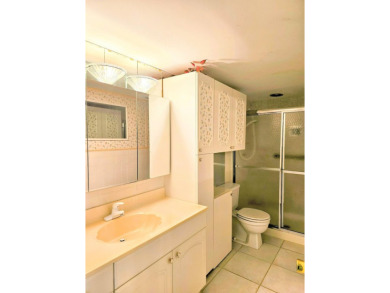 Unlock the potential of this 2-bedroom, 2-bath second-floor on Martin County Golf Course in Florida - for sale on GolfHomes.com, golf home, golf lot