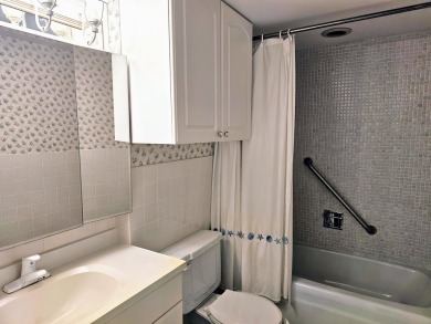 Unlock the potential of this 2-bedroom, 2-bath second-floor on Martin County Golf Course in Florida - for sale on GolfHomes.com, golf home, golf lot