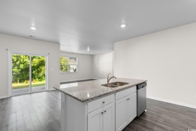 Welcome to 1128 Sennema Circle, where modern comfort meets on Island Green Golf Club in South Carolina - for sale on GolfHomes.com, golf home, golf lot