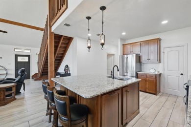 Discover the perfect retreat in Rock Creek. Nestled on the on Rock Creek Golf Club in Texas - for sale on GolfHomes.com, golf home, golf lot