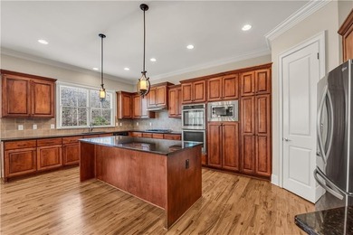 Perfect and meticulously maintained home in sought after St on St. Marlo Country Club in Georgia - for sale on GolfHomes.com, golf home, golf lot