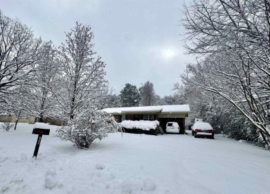 Nestled in the heart of Heber Springs, this beautiful home on  in Arkansas - for sale on GolfHomes.com, golf home, golf lot