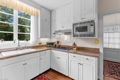 This iconic Old Irving Park home that sits on double lots is on Greensboro Country Club in North Carolina - for sale on GolfHomes.com, golf home, golf lot