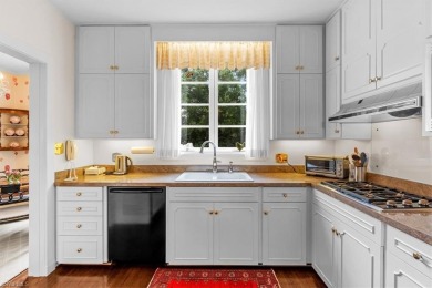 This iconic Old Irving Park home that sits on double lots is on Greensboro Country Club in North Carolina - for sale on GolfHomes.com, golf home, golf lot