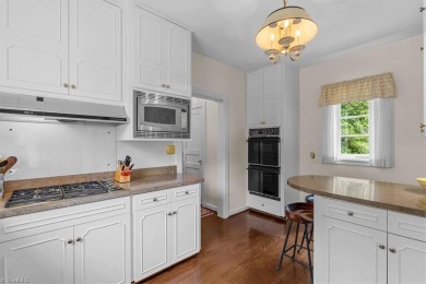 This iconic Old Irving Park home that sits on double lots is on Greensboro Country Club in North Carolina - for sale on GolfHomes.com, golf home, golf lot
