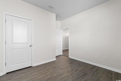 Welcome to 1128 Sennema Circle, where modern comfort meets on Island Green Golf Club in South Carolina - for sale on GolfHomes.com, golf home, golf lot
