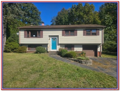 Spacious Raised Ranch with hardwood floors, Fireplace in Living on Elmridge Golf Course in Connecticut - for sale on GolfHomes.com, golf home, golf lot