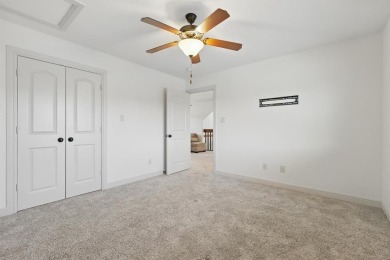 Discover the perfect retreat in Rock Creek. Nestled on the on Rock Creek Golf Club in Texas - for sale on GolfHomes.com, golf home, golf lot