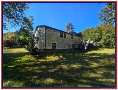 Spacious Raised Ranch with hardwood floors, Fireplace in Living on Elmridge Golf Course in Connecticut - for sale on GolfHomes.com, golf home, golf lot