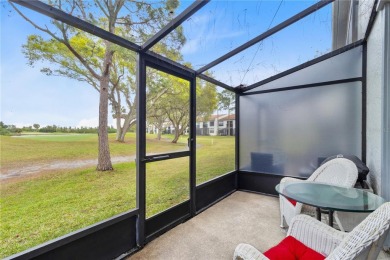 GROUND FLOOR, CORNER UNIT WITH UNOBSTRUCTED GOLF COURSE VIEWS on Feather Sound Country Club in Florida - for sale on GolfHomes.com, golf home, golf lot