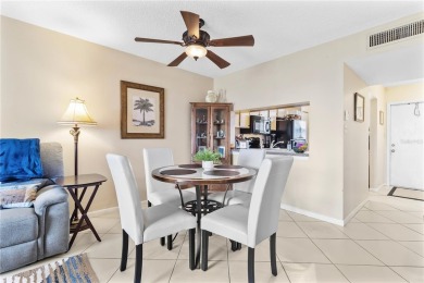 GROUND FLOOR, CORNER UNIT WITH UNOBSTRUCTED GOLF COURSE VIEWS on Feather Sound Country Club in Florida - for sale on GolfHomes.com, golf home, golf lot