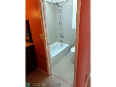 This fabulous 1 bedroom 1 1/2 bathroom condo is situated in an on Woodlands Country Club in Florida - for sale on GolfHomes.com, golf home, golf lot