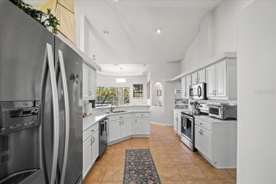Welcome to your dream oasis in the exclusive gated golf on Grand Haven Golf Club in Florida - for sale on GolfHomes.com, golf home, golf lot