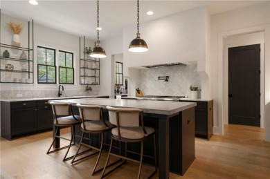 Stunning newer construction with modern flair, ideally located on Bobby Jones Golf Club in Georgia - for sale on GolfHomes.com, golf home, golf lot