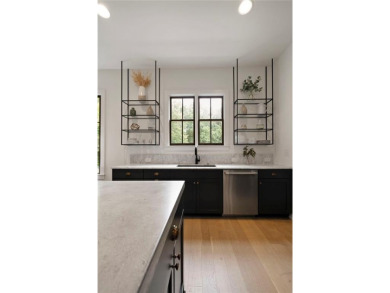 Stunning newer construction with modern flair, ideally located on Bobby Jones Golf Club in Georgia - for sale on GolfHomes.com, golf home, golf lot