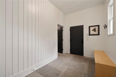 Stunning newer construction with modern flair, ideally located on Bobby Jones Golf Club in Georgia - for sale on GolfHomes.com, golf home, golf lot