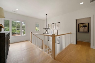 Stunning newer construction with modern flair, ideally located on Bobby Jones Golf Club in Georgia - for sale on GolfHomes.com, golf home, golf lot