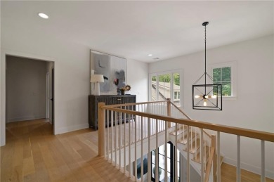 Stunning newer construction with modern flair, ideally located on Bobby Jones Golf Club in Georgia - for sale on GolfHomes.com, golf home, golf lot